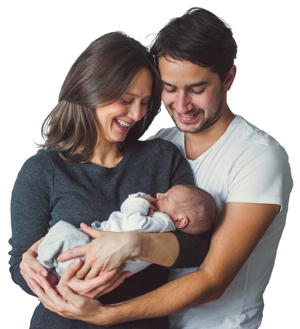 Family holding baby